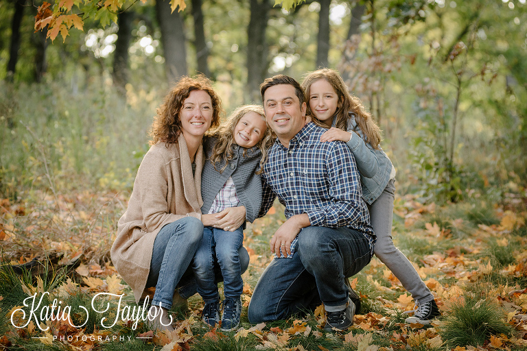 Family portrait in Toronto High Park in the Fall.