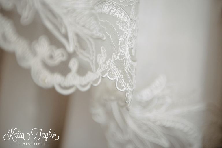 Detail of lace wedding gown.