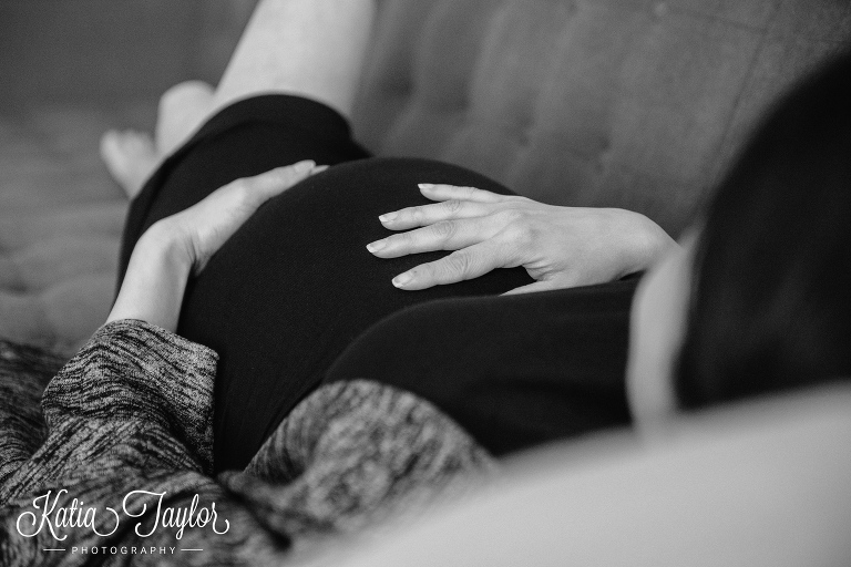 Creative angle of baby bump. Toronto maternity portraits.