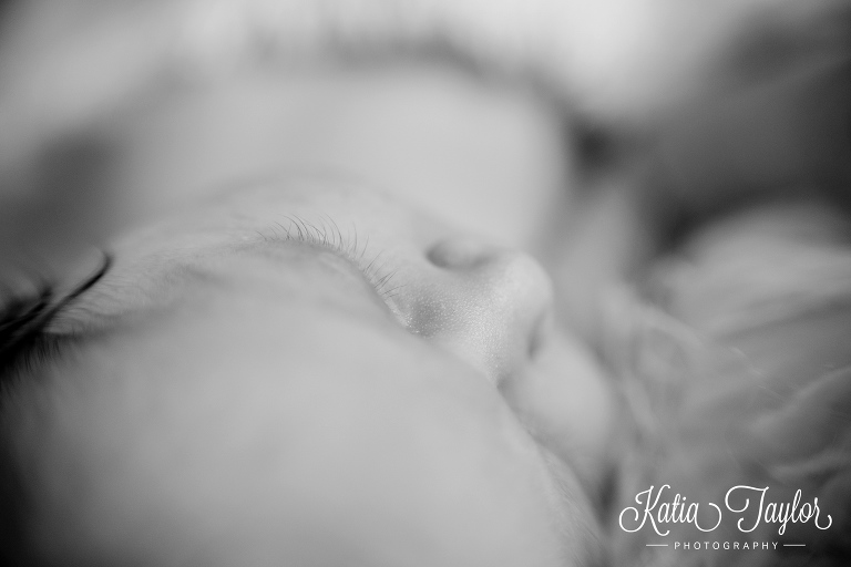 Close-up macro shot of newborn's eyelashes. Toronto lifestyle newborn portraits. www.katiataylorphotography.com