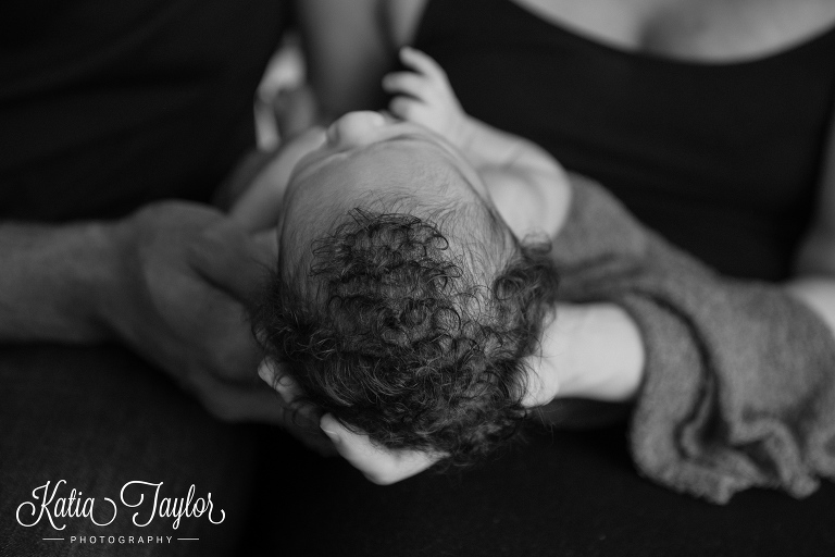 Cute curly hair on newborn baby. Toronto newborn portraits.