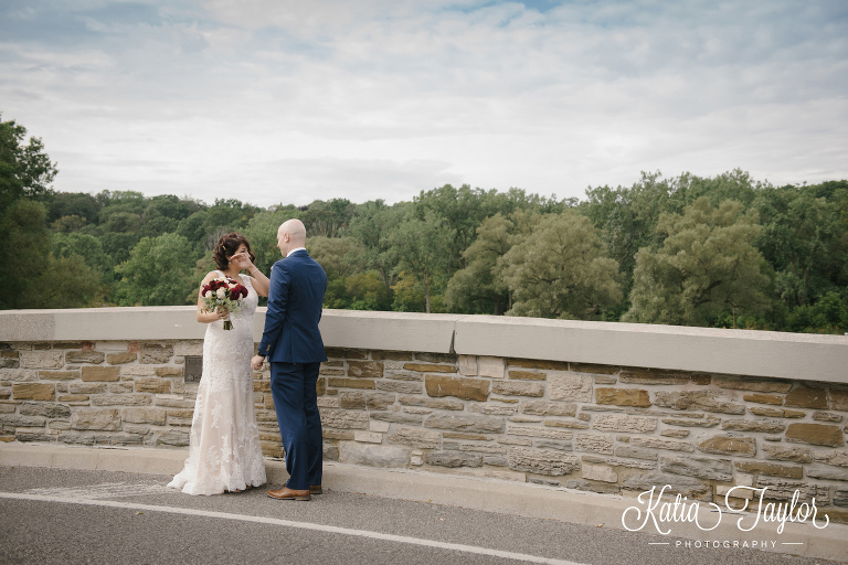 Bride and groom's first look on bridge. Etienne Brule Park. Toronto wedding at Propeller Coffee Co.