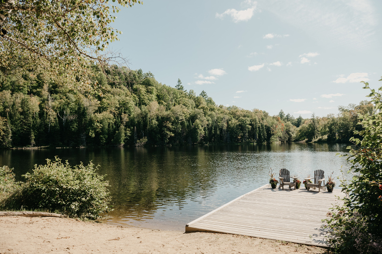 Cressy lake with Muskoka chairs. Haliburton Ontario wedding. Rustic country wedding.