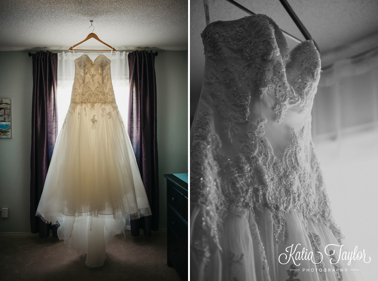 Bridal gown hanging in the window. Toronto FountainBlue wedding photography.