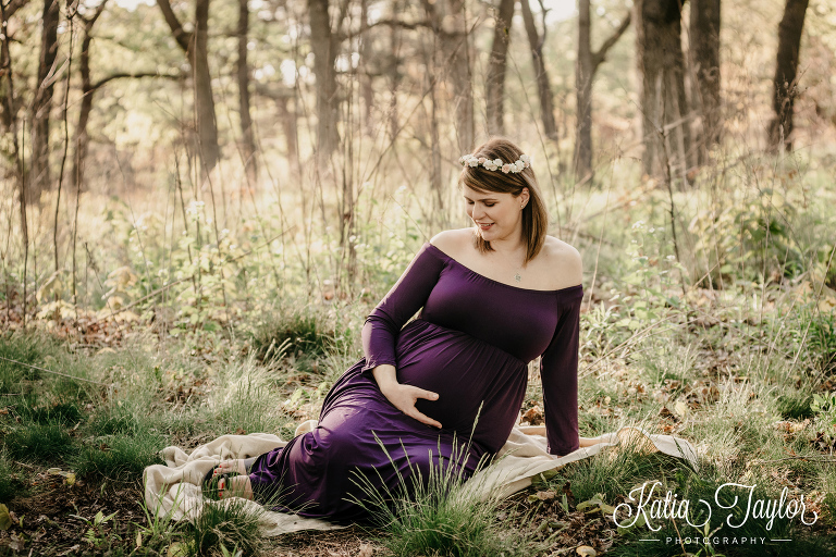Maternity portraits in the forest. Purple gown and flower crown. Toronto High Park Maternity Portraits.