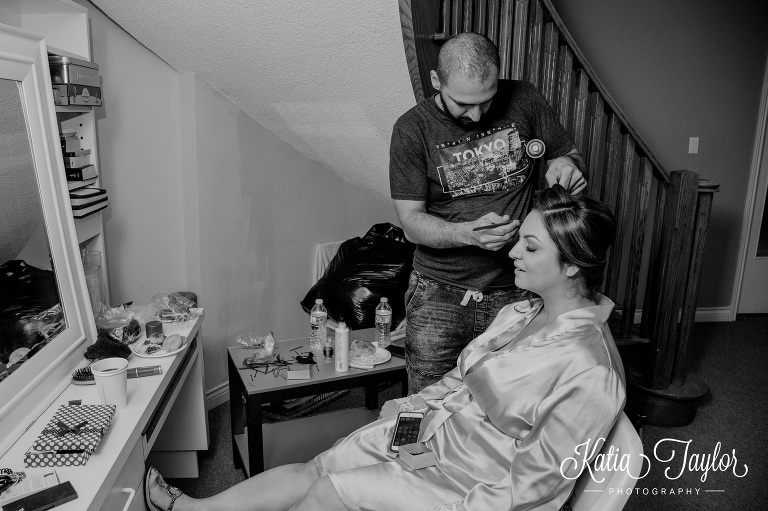 Bride getting her hair done. Toronto wedding photography.