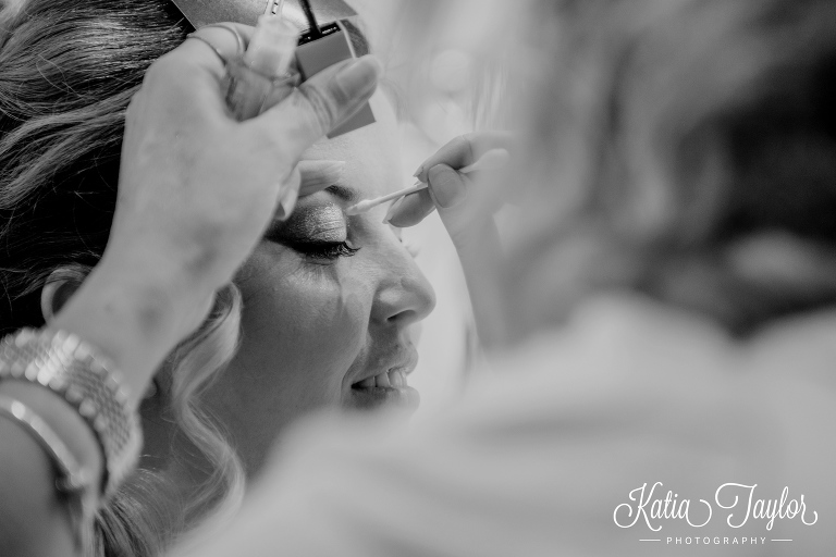 Bride getting her makeup done on wedding day. Toronto wedding photography.