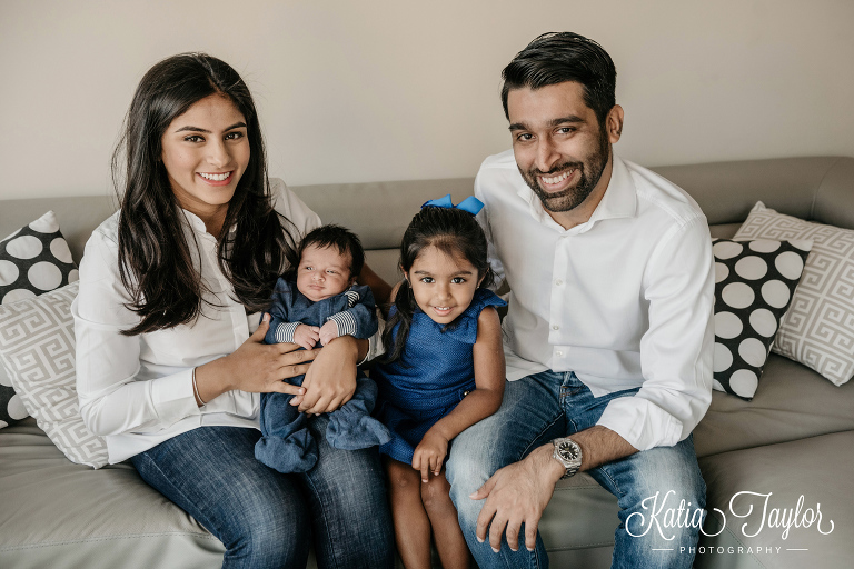 Parents with newborn baby boy and 4-year-old daughter.