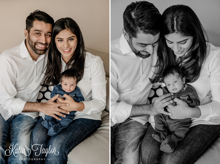 Parents in white shirts with their newborn baby boy.