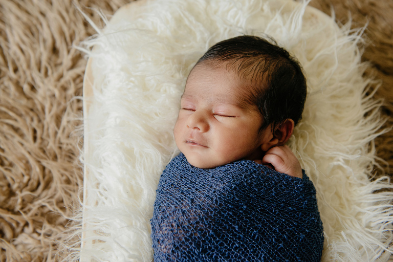 Sleeping newborn baby boy