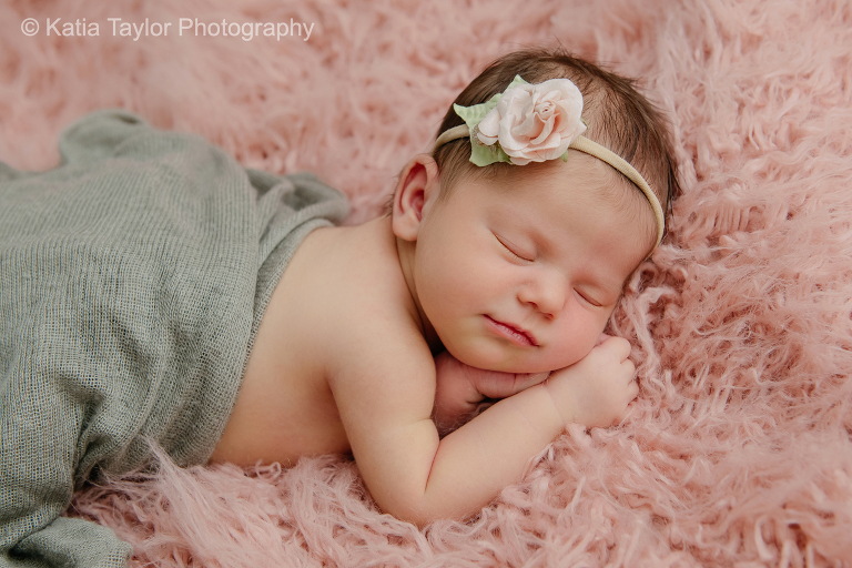 A newborn baby girl sleeping